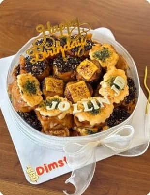 Dimsum cake dengan tulisan custom dan pita
