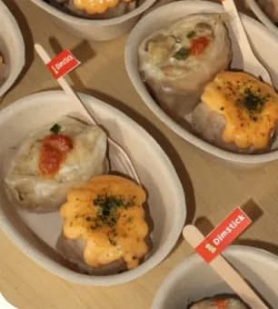 Dimsum jumbo dengan topping mentai di cup bagasse
